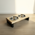 Elevated pet feeding station with attractive background